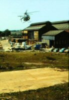 Helicopter arriving for the filming of 'A Clearing in the Woods' in 1984