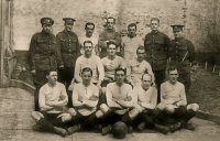 The name of the football team represented on this photograph is not known, but it is probably the Riddings Ironworks Team. It dates from the First World War period, possibly 1914.