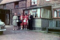 Photograph taken of a wedding party at Pennytown in the 1960s. The people in the photograph are not currently known.