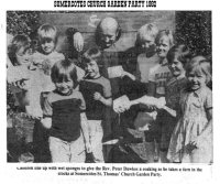 Newspaper article regarding a garden party held at the Church of St. Thomas in 1982. The Reverend Peter Dawkes is in the stocks!