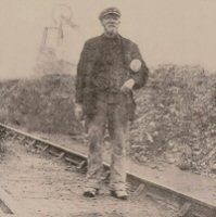 Newspaper Photograph the headlines were: 1912 the Great Strike begins - two thousand Miners down tools and desert the Pits. The photo is of Alfreton Colliery from the 1912 strike and the miner's name is John Marshall, the first man to strike.