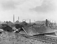 View looking over the Riddings Ironworks, note he number of chimneys and the clouds of smoke going up into the air