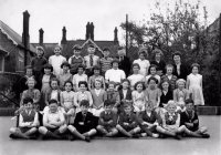 Teacher and Pupils at Somercotes School date not known