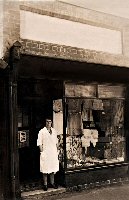 Ladies Fashion and Corset shop Nottingham Road. The name Emmie appears to be on a sign on the door the rest is unreadable.