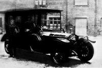 The Rolls Royce car owned by Charles Seely pictured with Chauffeur and footman.